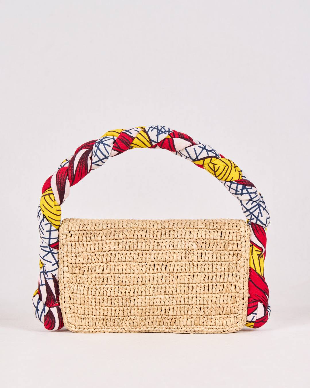 Sac VINA en raphia et wax rouge et jaune, porté épaule structuré et raffiné, vue de dos